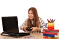 Little girl plays a video game on a laptop Royalty Free Stock Photo