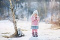 Little girl with plush bunny