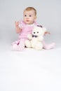 Little girl with plushy cuddle-bear. Royalty Free Stock Photo