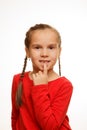 Little girl point by finger her first missing milk tooth, white background Royalty Free Stock Photo