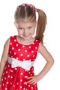 Little girl in a polka dot red dress