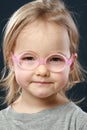 Little girl portrait in pink glasses Royalty Free Stock Photo