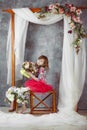 Little girl portrait in pink tutu under decorative wedding arch Royalty Free Stock Photo