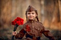 Little girl portrait in Soviet military uniform Royalty Free Stock Photo
