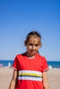 Little girl posing on the beach