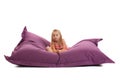 Little girl posing on beanbag Royalty Free Stock Photo