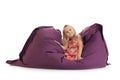 little girl posing on beanbag Royalty Free Stock Photo