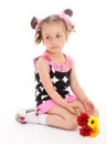 Little girl posing with a bouquet of flowers Royalty Free Stock Photo