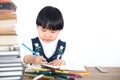 Little girl practicing writing in class Royalty Free Stock Photo