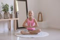 Little girl practicing yoga at home Royalty Free Stock Photo