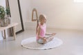 Little girl practicing yoga at home Royalty Free Stock Photo