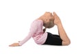 Little girl practicing yoga on white background