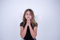 Little Girl praying with angel wings Royalty Free Stock Photo