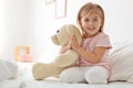 Little girl praying in bed at home Royalty Free Stock Photo