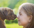 Little girl with a puppy