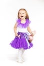 Little girl in a purple skirt Royalty Free Stock Photo