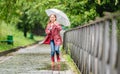 Little girl running through puddles Royalty Free Stock Photo