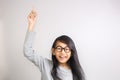 Little Girl Raise Her Hand and Pointing Finger Up Royalty Free Stock Photo