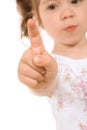 Little girl raising finger