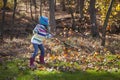 Little Girl Rakes Leaves Royalty Free Stock Photo