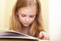 Little girl reading Royalty Free Stock Photo