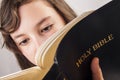 Little girl reading the bible Royalty Free Stock Photo