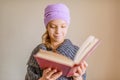 Little girl reading big book Royalty Free Stock Photo