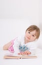 Little girl reading book Royalty Free Stock Photo