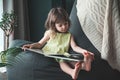 Little girl reading a book Royalty Free Stock Photo