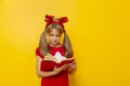 Little girl reading Christmas stories