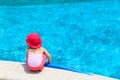 Little girl ready to jump into the pool with noodle Royalty Free Stock Photo