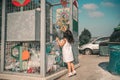 Little Girl Recycling Plastic Water Bottles. Crate of plastic water bottles ready for recycling in bin.