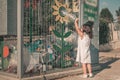 Little Girl Recycling Plastic Water Bottles. Crate Of Plastic Water Bottles Ready For Recycling In Bin.