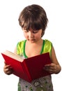 Little girl with red book isolated on white background Royalty Free Stock Photo