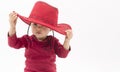 Little girl with red cowboy hat Royalty Free Stock Photo