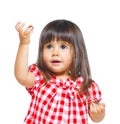 Little girl in red making funny face. Royalty Free Stock Photo