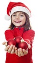 Little girl with a red santa cap Royalty Free Stock Photo