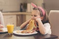 Little girl refuses to eat breakfast