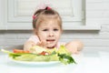 Little girl refuses vegetables Royalty Free Stock Photo