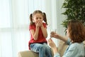 Little girl refusing take pill at home Royalty Free Stock Photo