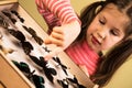 Little Girl Researching Entomology Collection of Tropical Butterflies Royalty Free Stock Photo