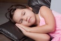 Little girl resting on the couch Royalty Free Stock Photo