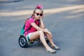 Portrait of a little girl on an ecological electric vehicle Royalty Free Stock Photo