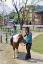 Little girl ride the horse Royalty Free Stock Photo