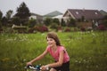 Little girl riding bicycle in the countryside Royalty Free Stock Photo