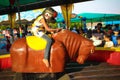 Little Girl Riding Mechanic Bull at Ramoji Film Studio