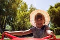 A little girl riding a carousel Royalty Free Stock Photo