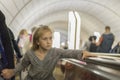 little girl is riding an escalator. Royalty Free Stock Photo