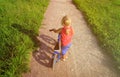 Little girl riding runbike in summer Royalty Free Stock Photo