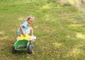 Little girl riding a tractor